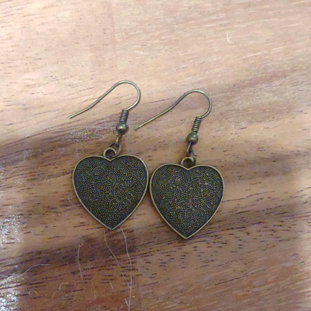 Metal heart-shaped dangle earrings